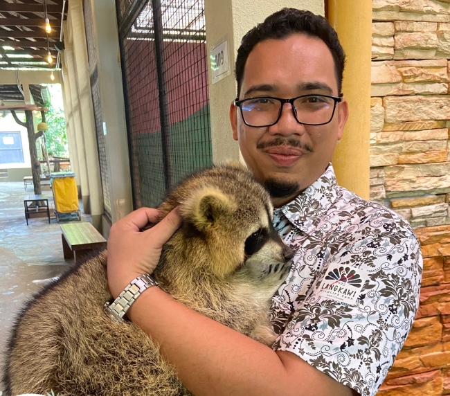 Langkawi Wildlife Park koala bear hugging a person